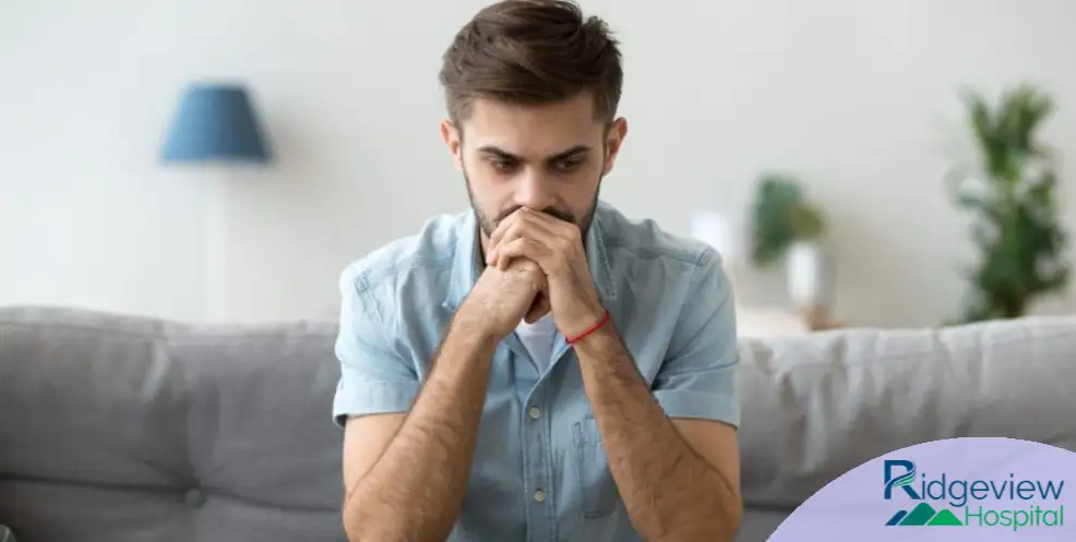 Man thinking about going to a rehab