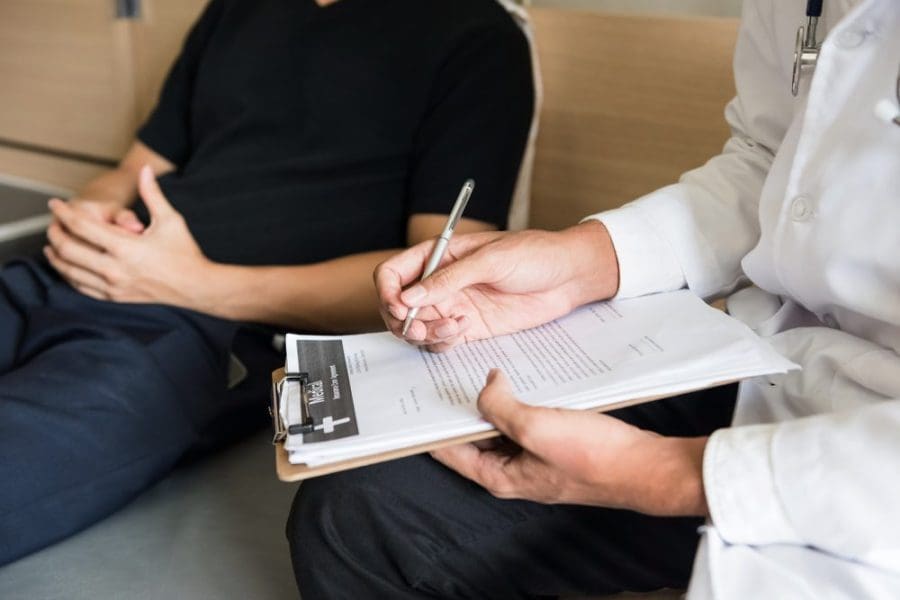 Patient talking with doctor about Partial Hospitalization Program