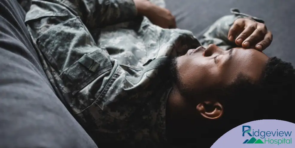 Veteran laying down on couch