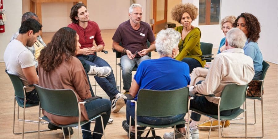 meeting group talking about sleep issues