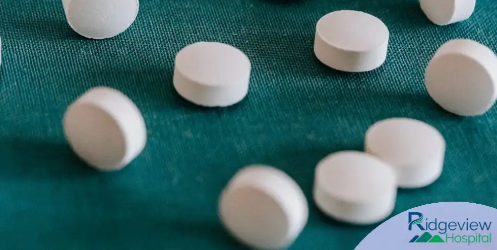 pills on the green table