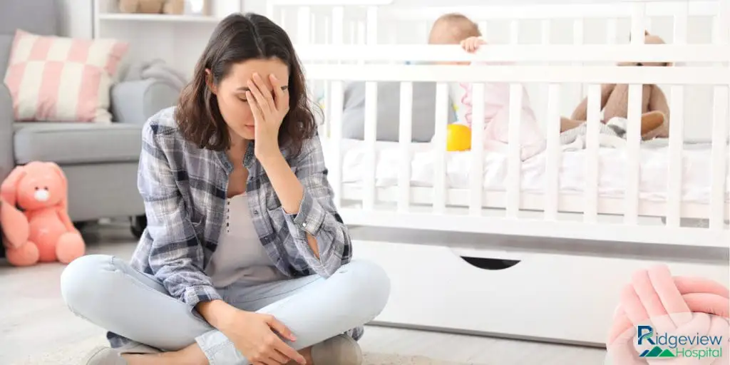 woman having postpartum depression