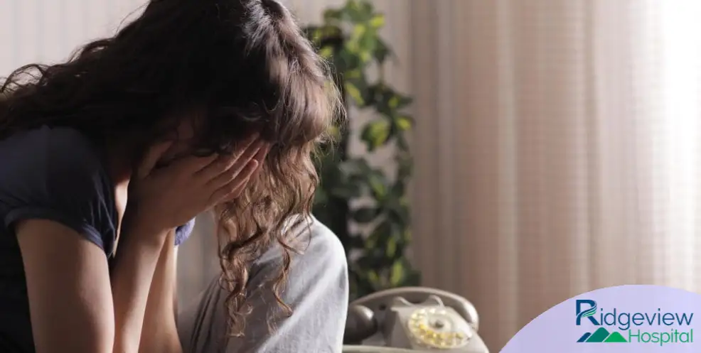 woman not feeling well